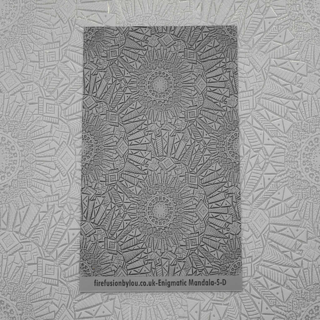 A debossed texture mat with an array of mandala flowery petals. Use to make an impression on metal clay and polymer clay.