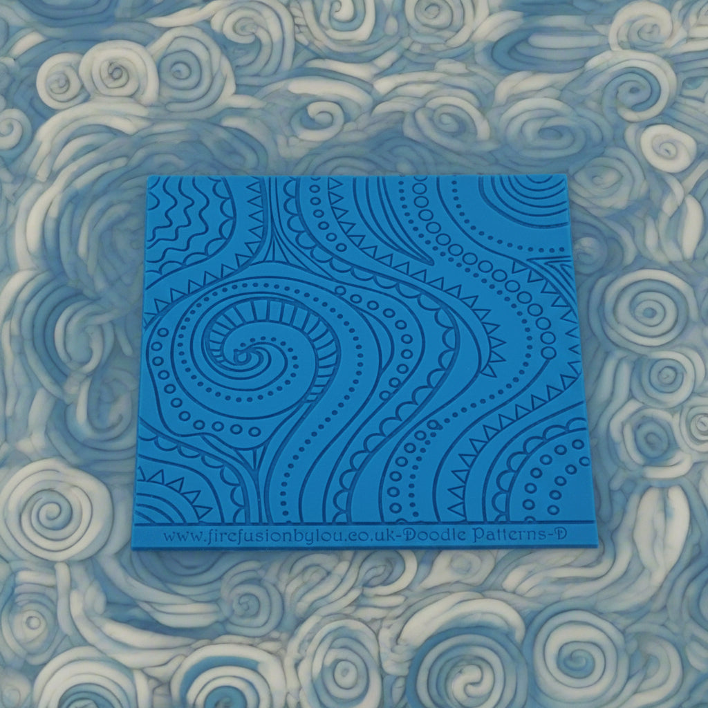 A pattern debossed texture mat. This texture mat will give you an embossed effect on metal clay or polymer clay.