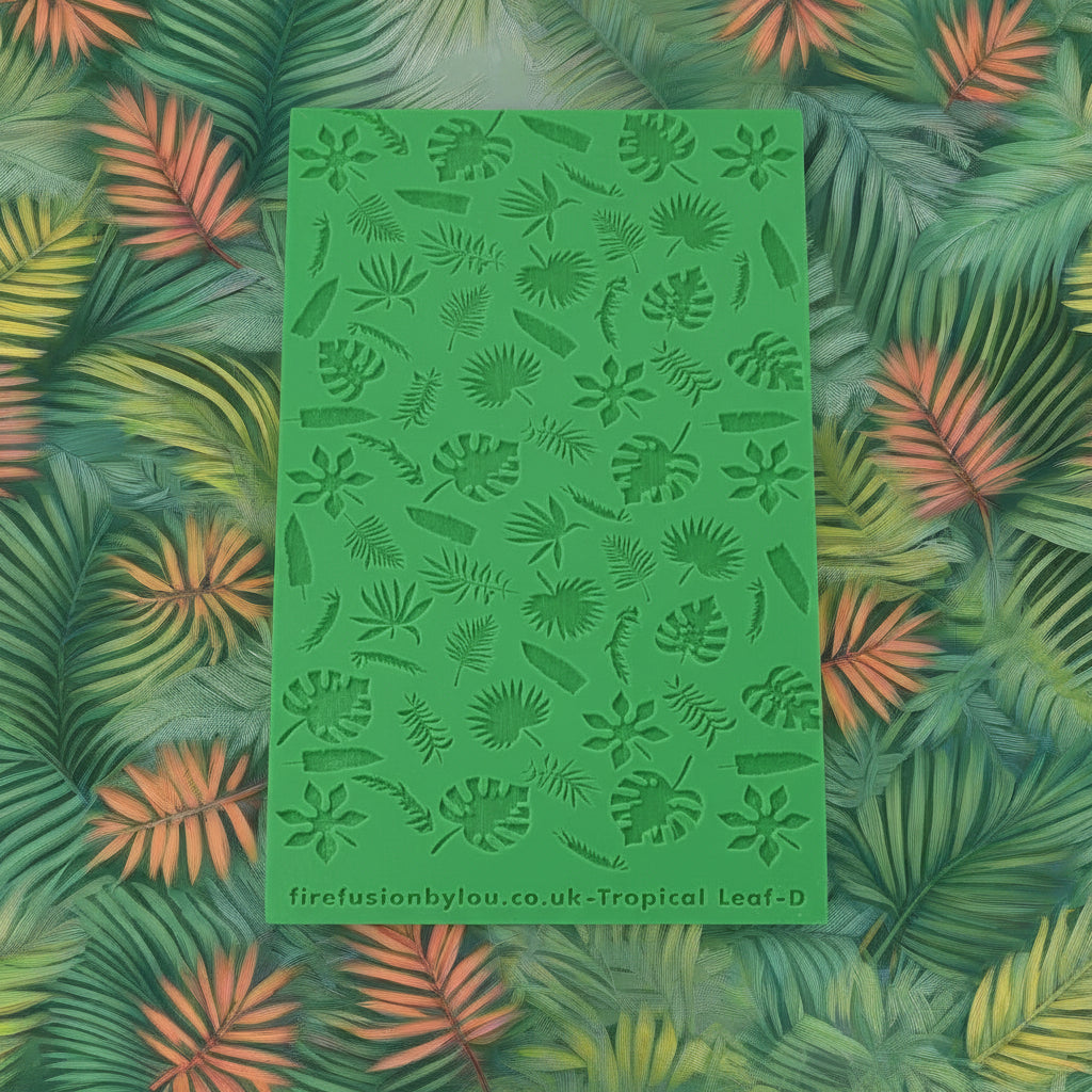 A 95 x 55 mm texture mat with with small tropical leaves in a repeat pattern. Use to make a embossed impression on metal clay and polymer clay.