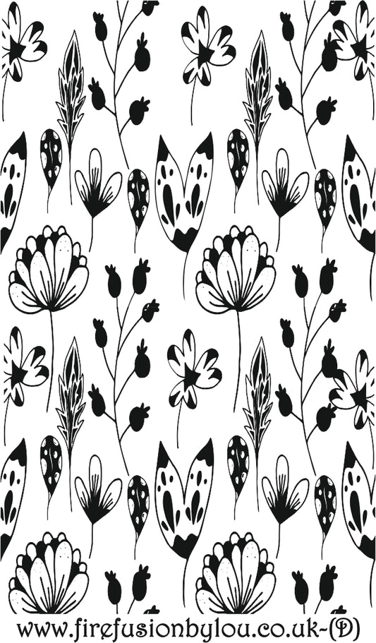 A debossed texture mat of flowers. This picture shows the texture mat pattern in black and white for use on metal clay or polymer clay.