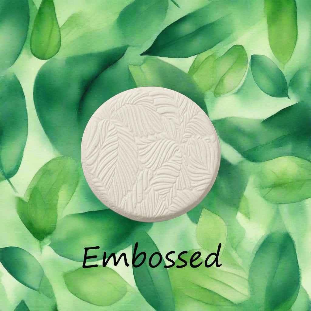 Leaves debossed in clay Using a  embossed texture mat. This will give you an idea of what it will look like on metal clay or polymer clay