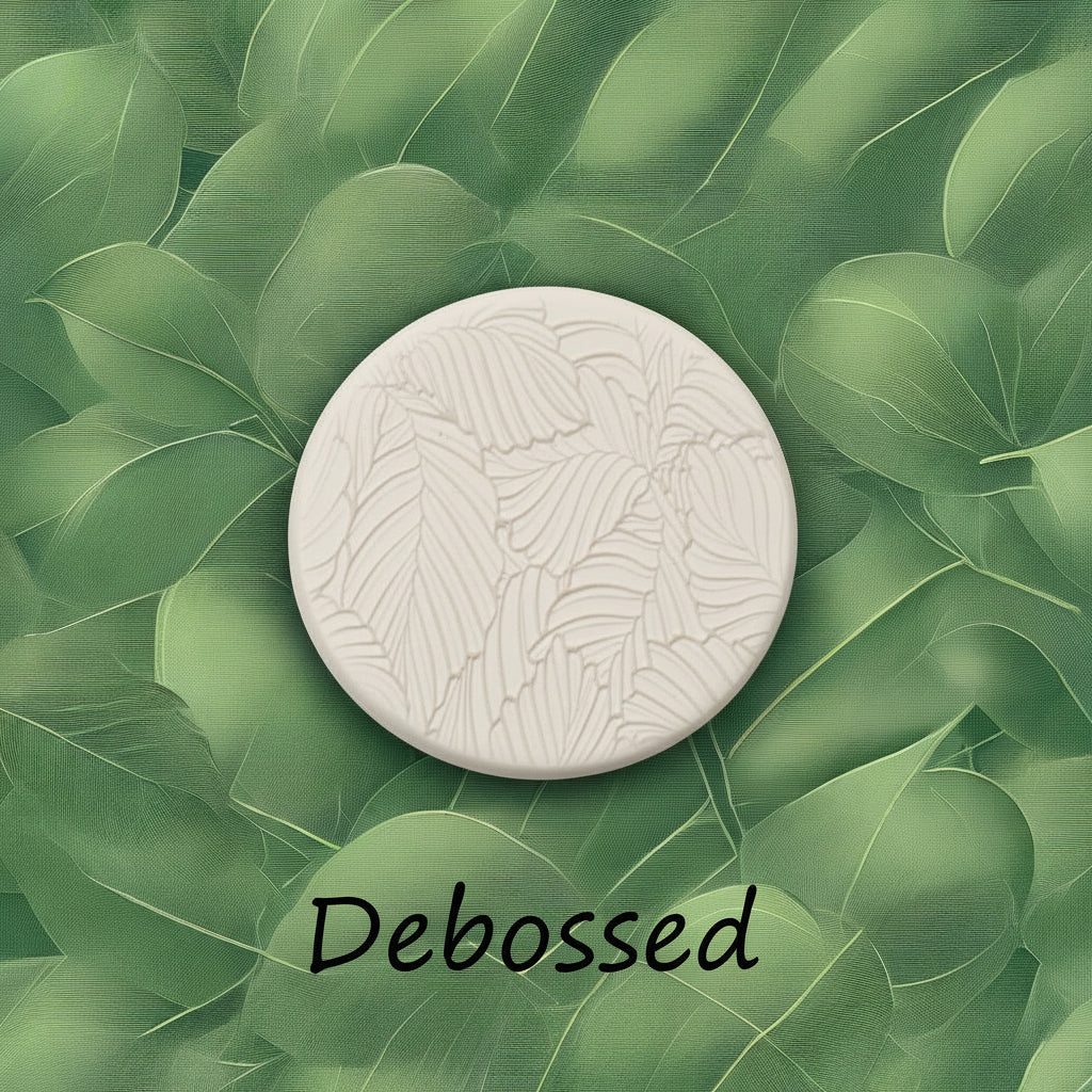 Leaves embossed in clay using a  debossed texture mat. This will give you an idea of what it will look like on metal clay or polymer clay