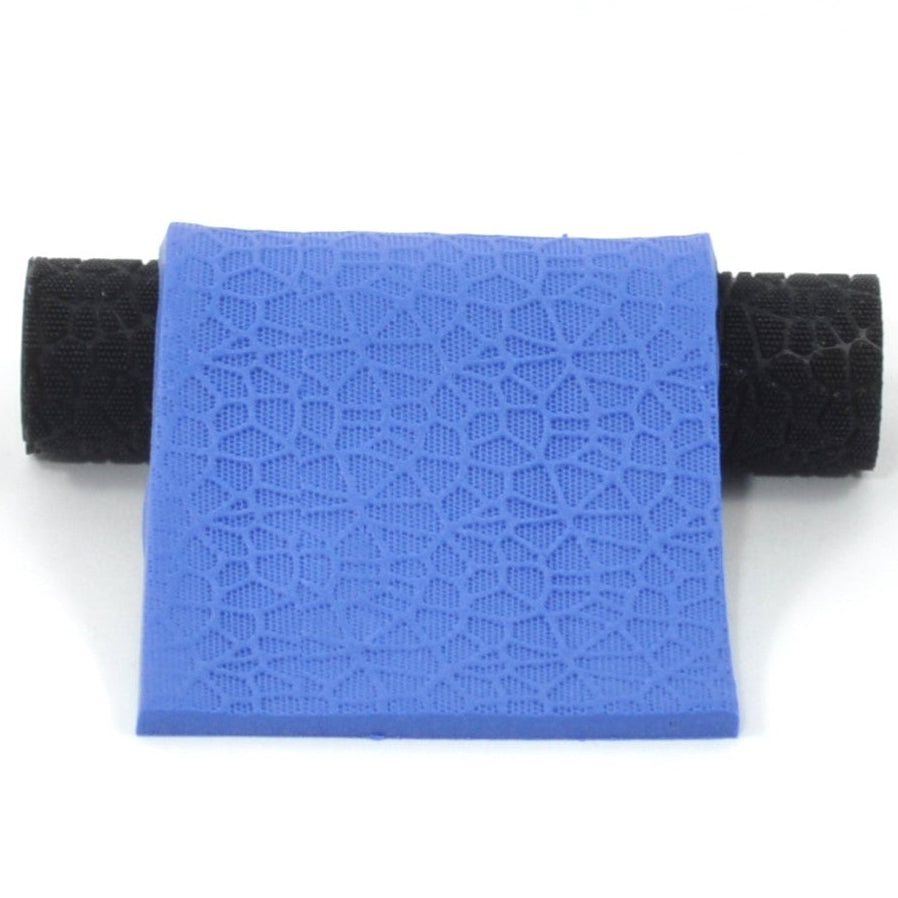 Blue textured square with black cylindrical objects on a white background