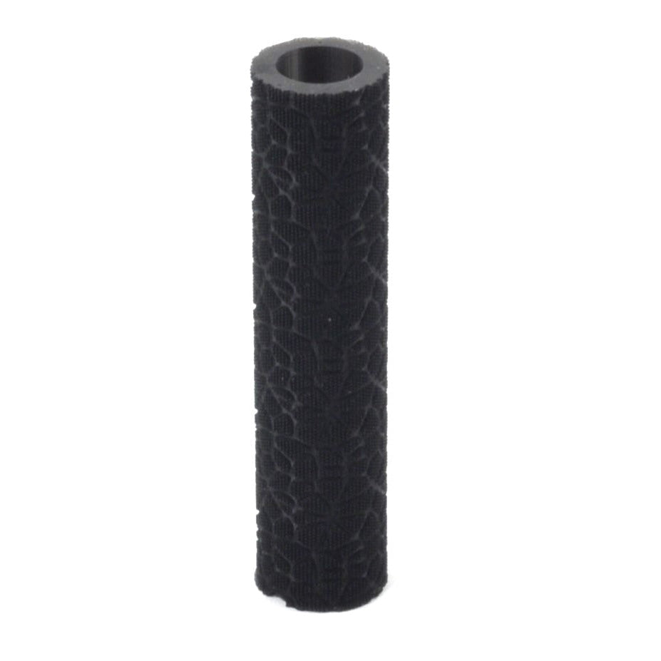 A black textured roller for metal clay or polymer clay, with an ergonomic shape designed to fit under four fingers for rolling.