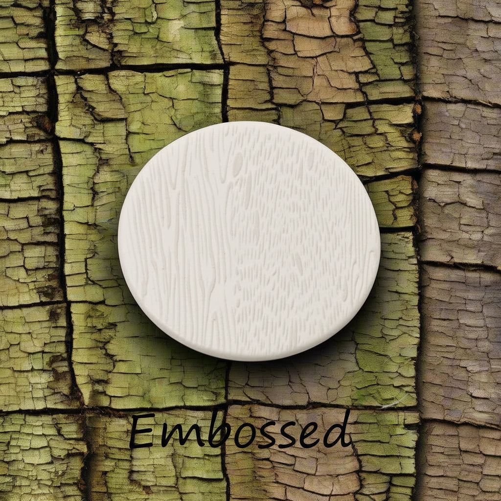 Tree bark designs debossed in clay Using a  debossed texture mat. This will give you an idea of what it will look like on metal clay or polymer clay.