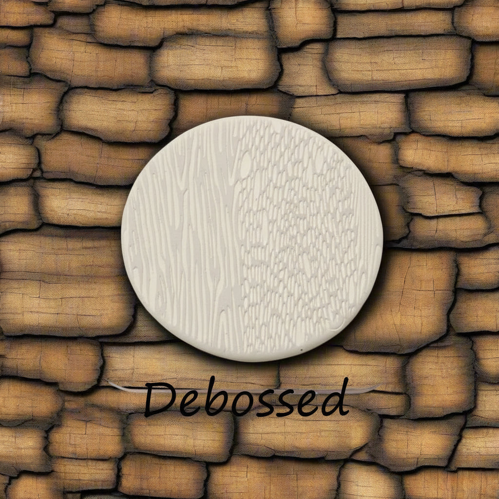 Tree bark designs embossed in clay Using a  debossed texture mat. This will give you an idea of what it will look like on metal clay or polymer clay.