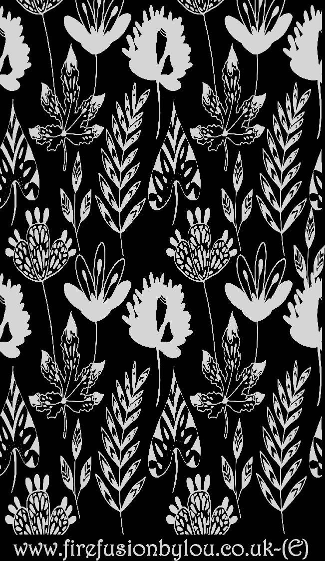 An embossed texture mat of flowers. This picture shows the texture mat pattern in black and white for use on metal clay or polymer clay.